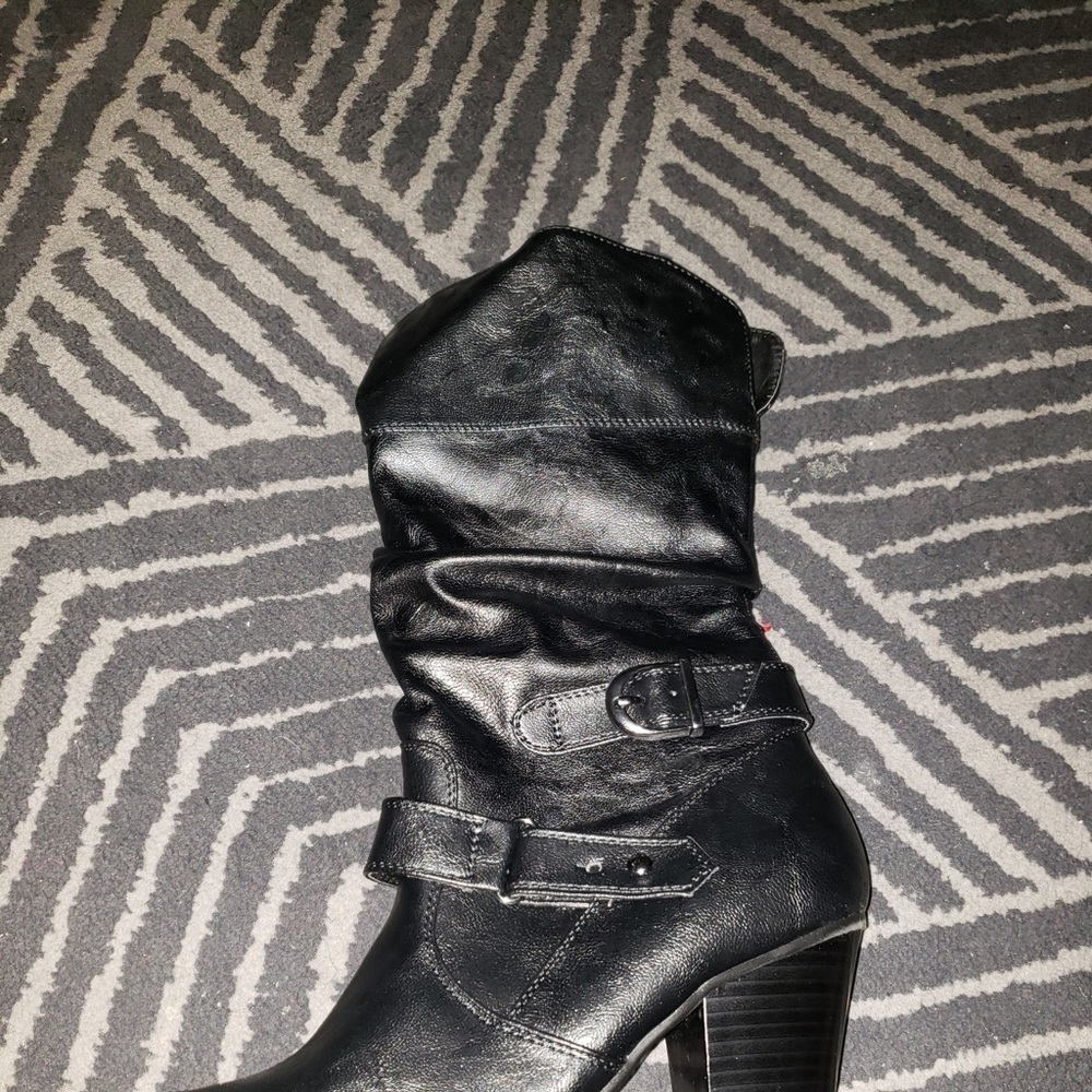 Boots with buckles.
